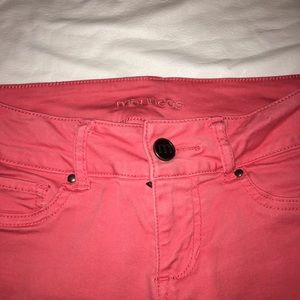 Salmon colored Maurice’s stretchy skinny jeans
